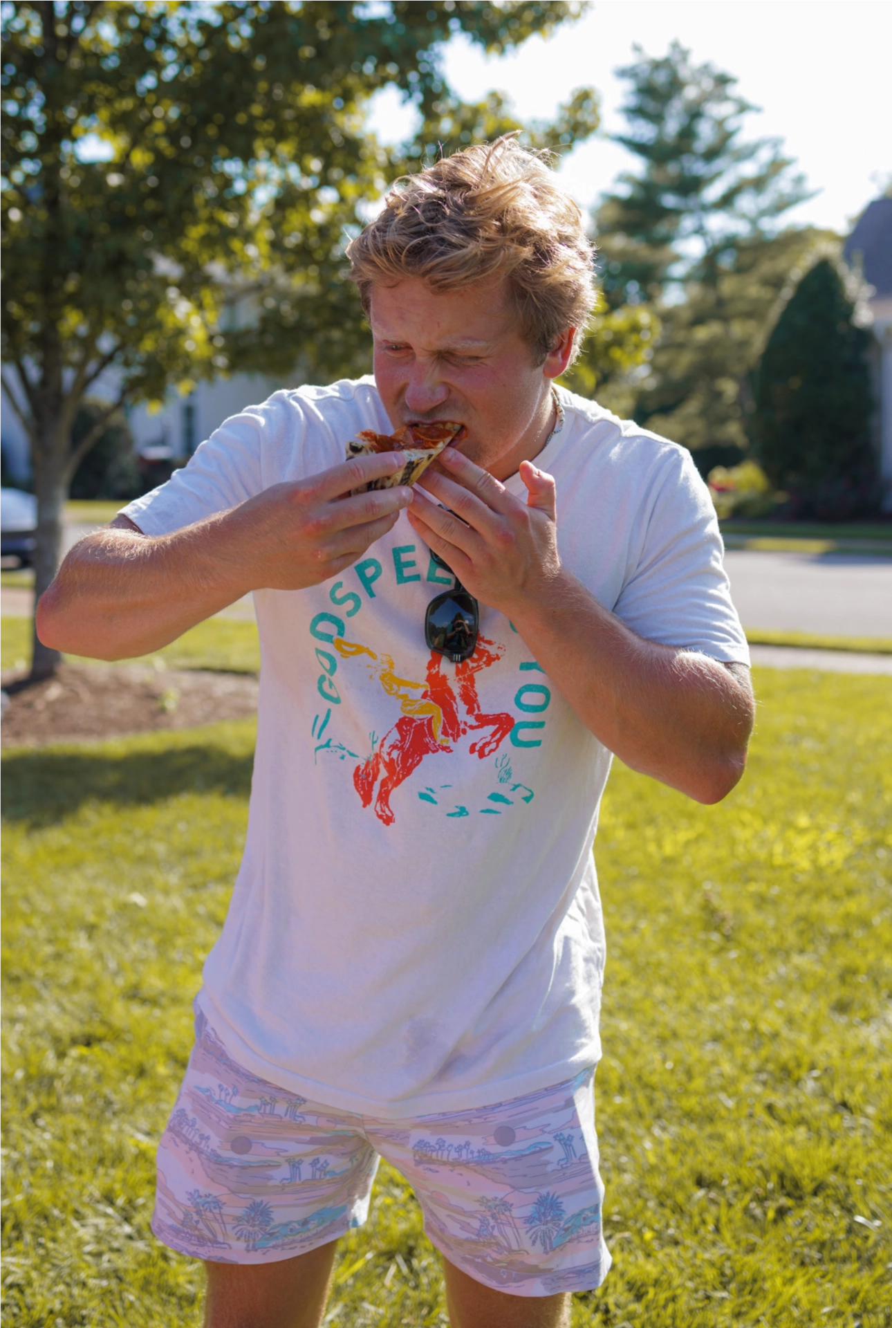 Man Eating Pizza